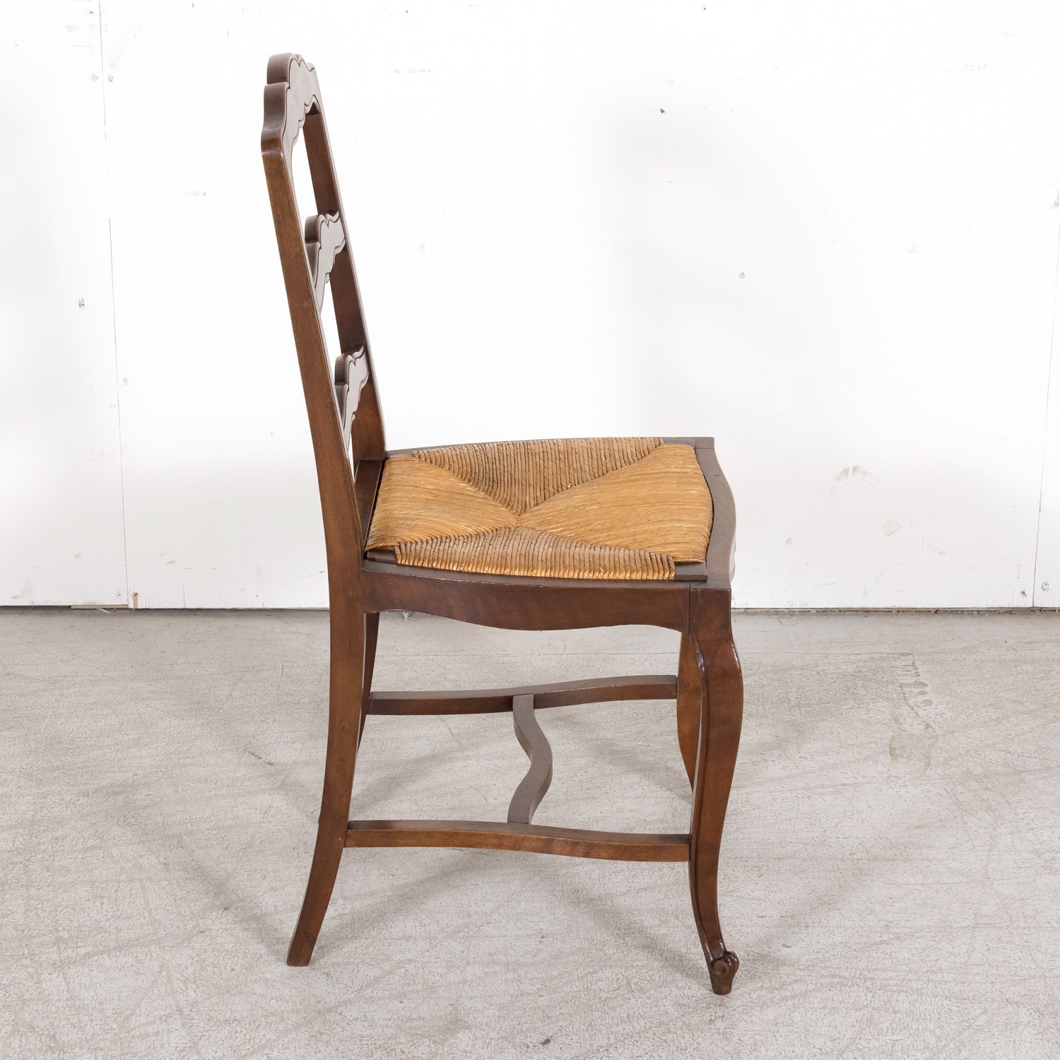 19th Century Country French Louis XV Style Walnut Ladder Back Dining Chairs with Rush Seats, Set of Eight