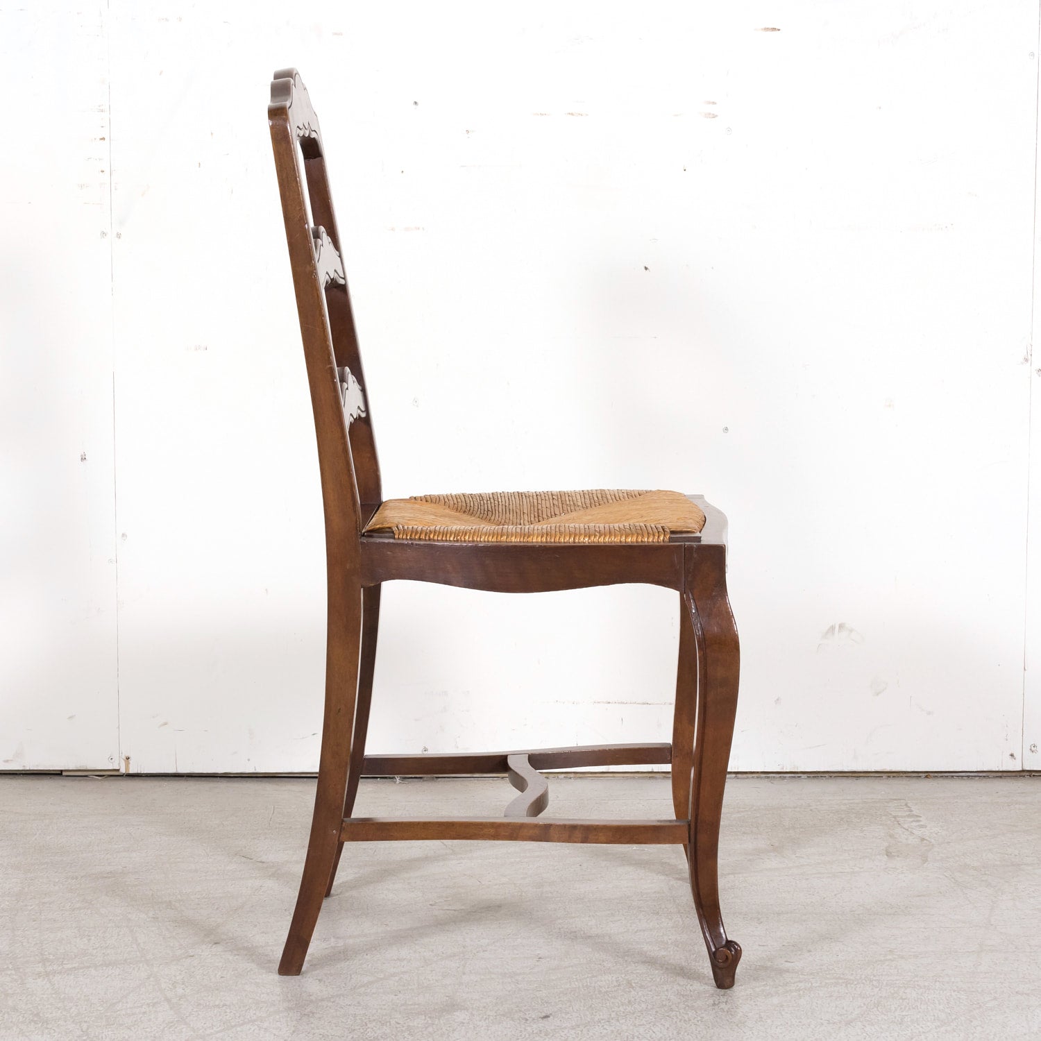 19th Century Country French Louis XV Style Walnut Ladder Back Dining Chairs with Rush Seats, Set of Eight