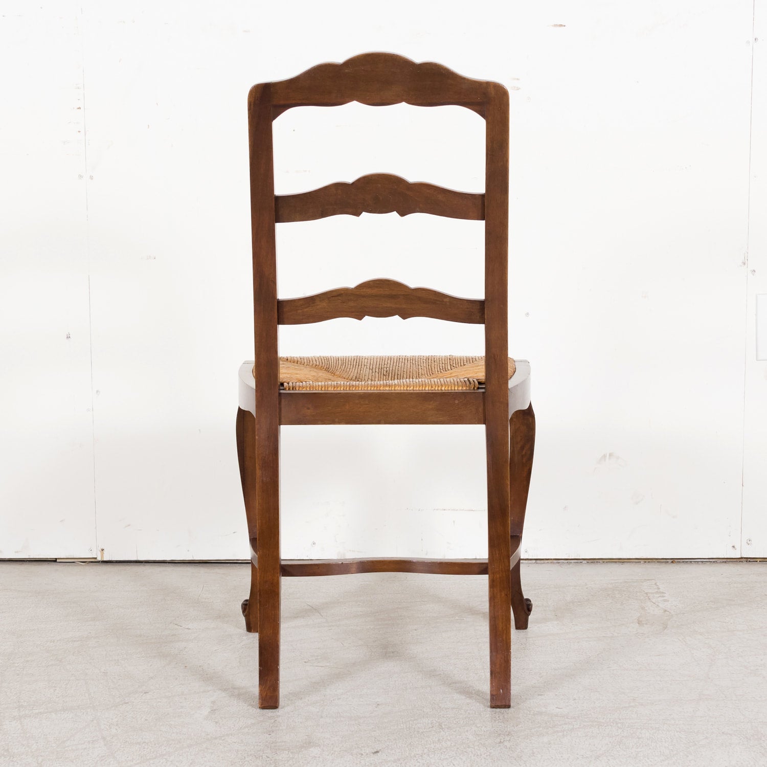 19th Century Country French Louis XV Style Walnut Ladder Back Dining Chairs with Rush Seats, Set of Eight