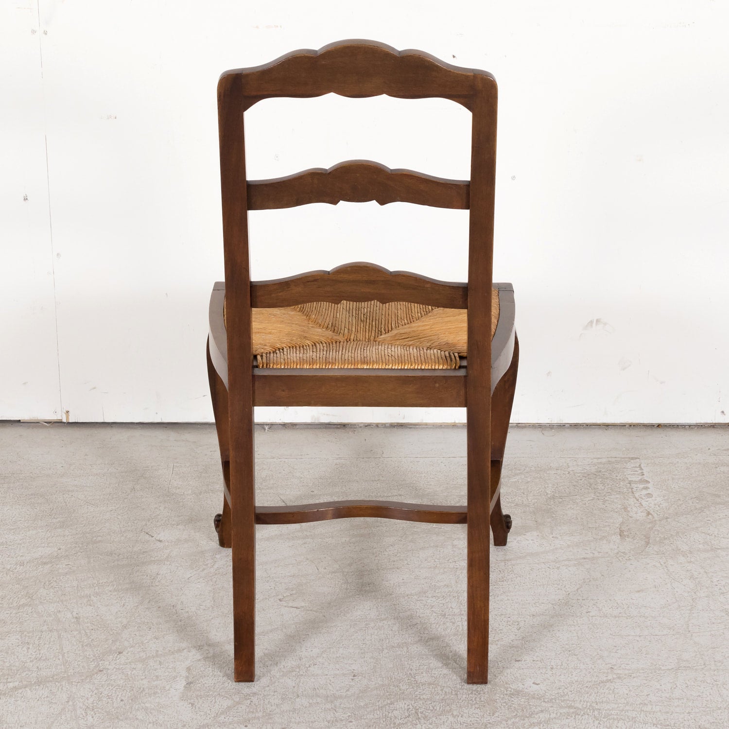 19th Century Country French Louis XV Style Walnut Ladder Back Dining Chairs with Rush Seats, Set of Eight