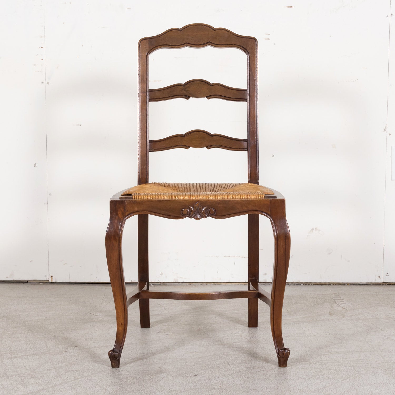 19th Century Country French Louis XV Style Walnut Ladder Back Dining Chairs with Rush Seats, Set of Eight