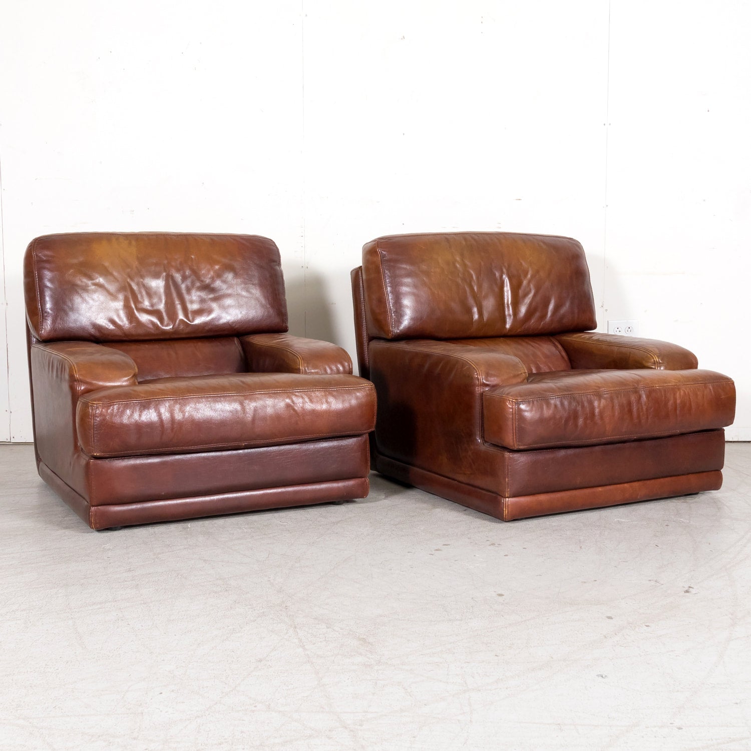 1970s Pair of French Mid-Century Modern Oversized Cognac Leather Armchairs or Lounge Chairs