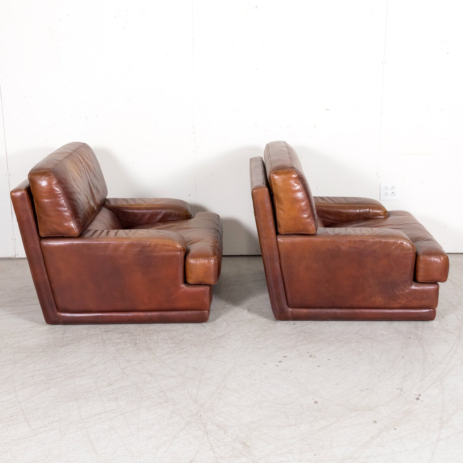 1970s Pair of French Mid-Century Modern Oversized Cognac Leather Armchairs or Lounge Chairs