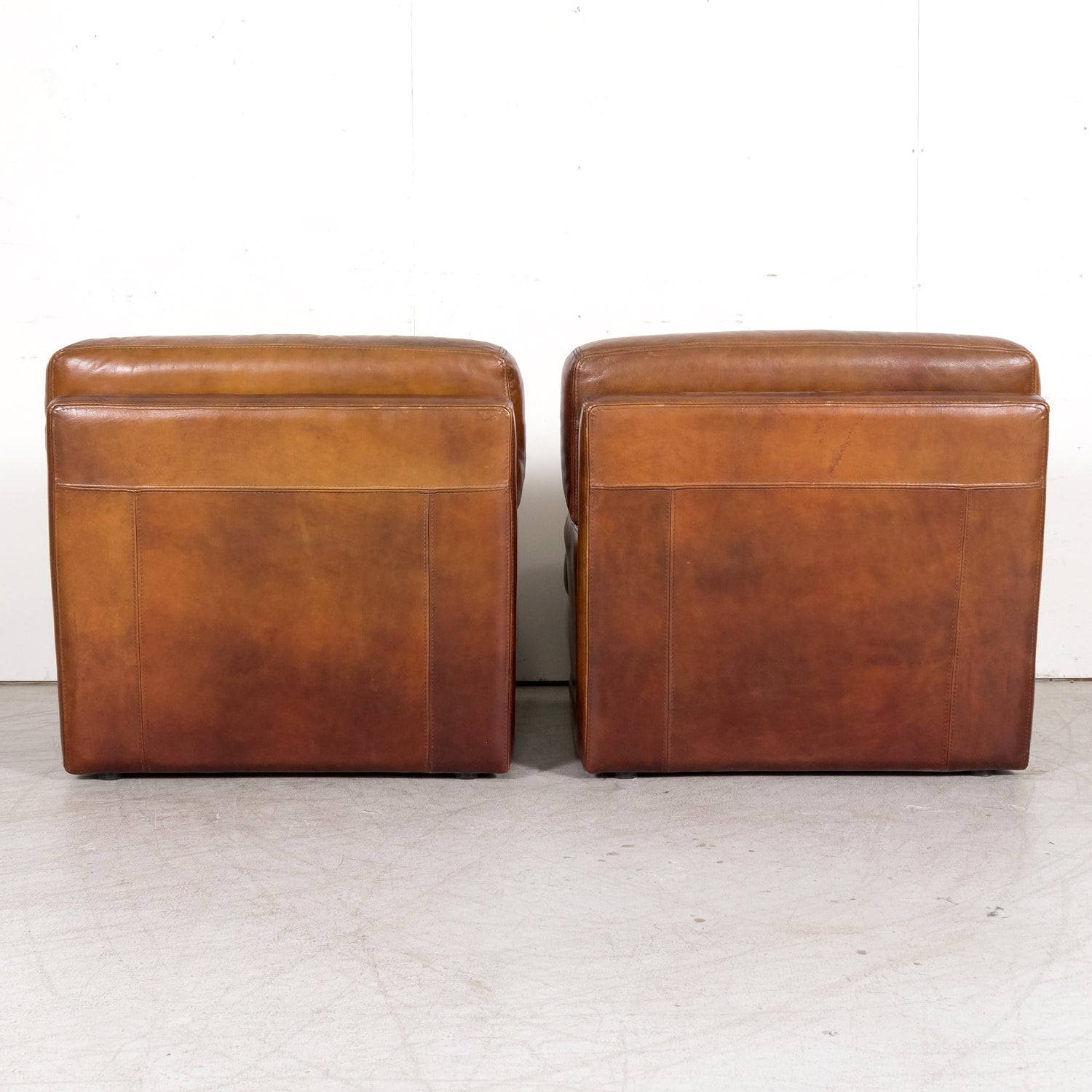 1970s Pair of French Mid-Century Modern Oversized Cognac Leather Armchairs or Lounge Chairs