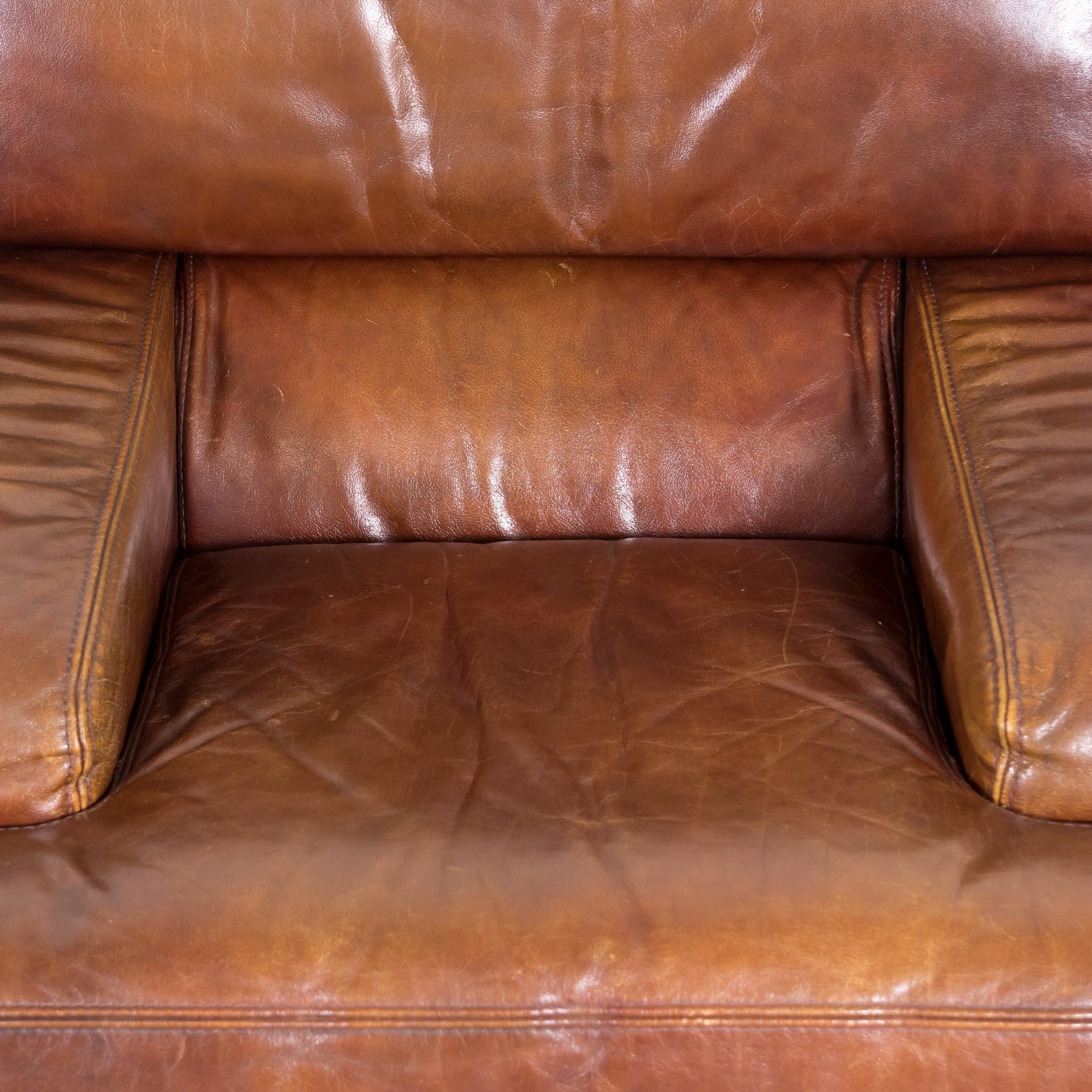 1970s Pair of French Mid-Century Modern Oversized Cognac Leather Armchairs or Lounge Chairs