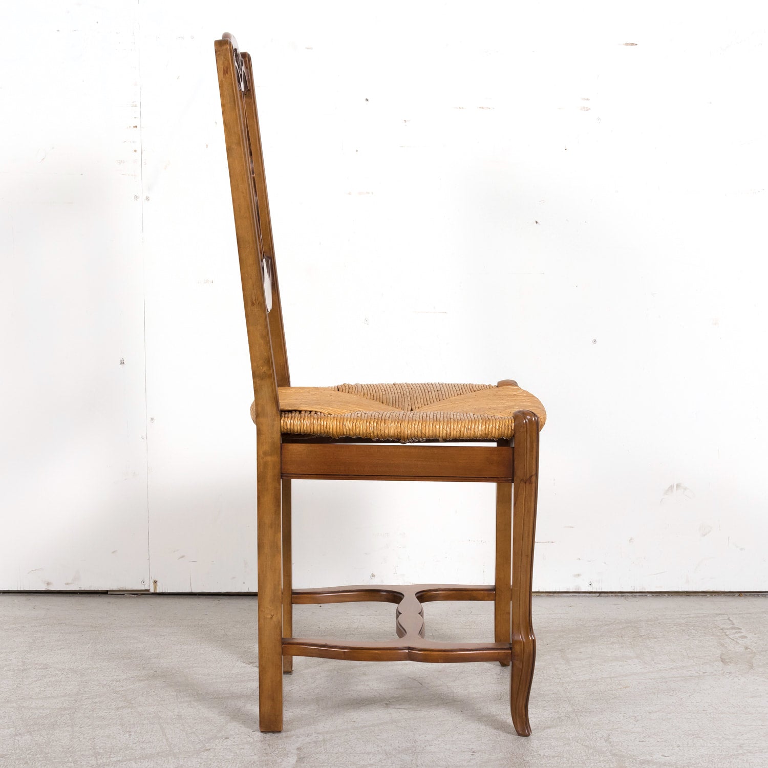 Set of Eight 19th Century Country French Louis XV Style Carved Walnut Dining Side Chairs with Rush Seats