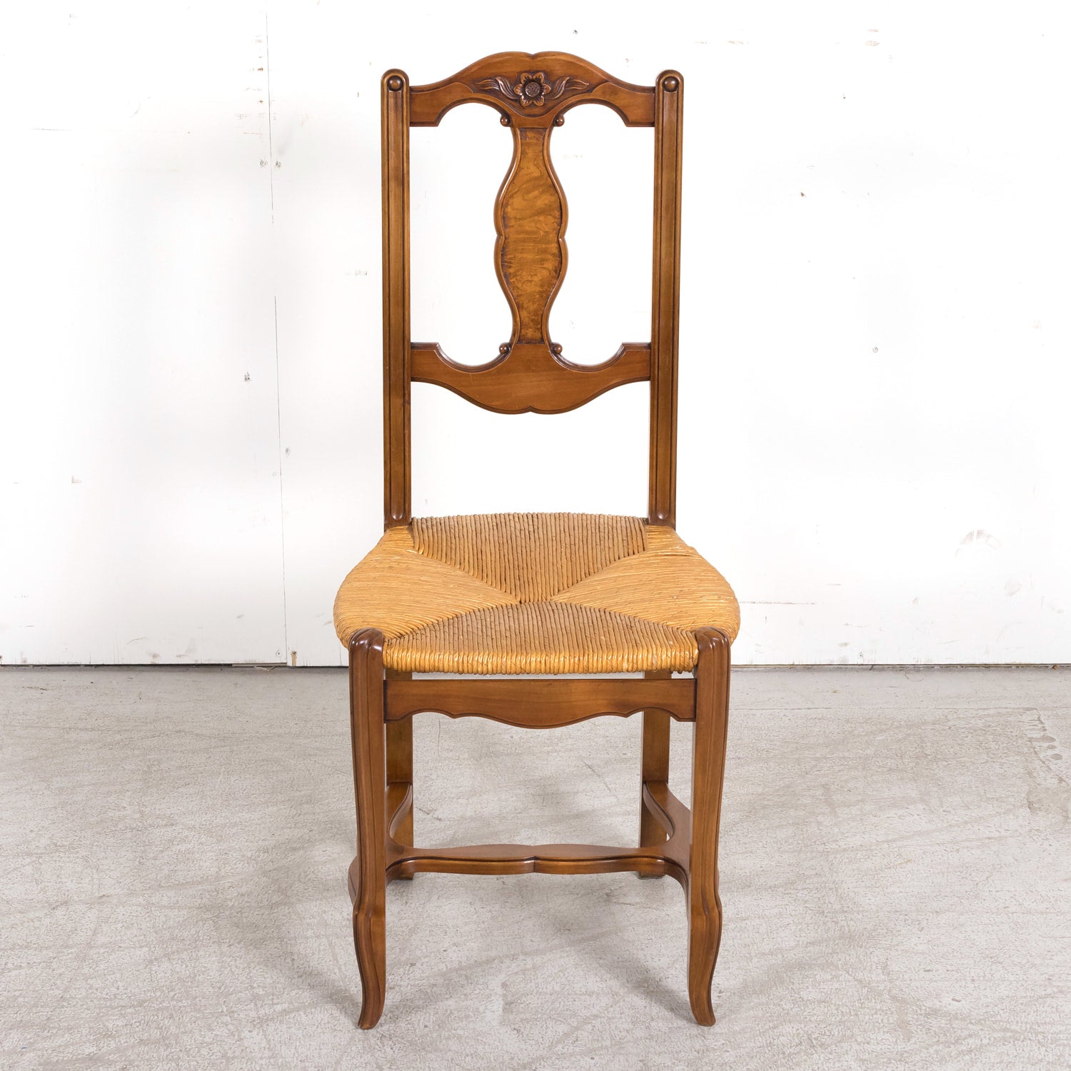 Set of Eight 19th Century Country French Louis XV Style Carved Walnut Dining Side Chairs with Rush Seats