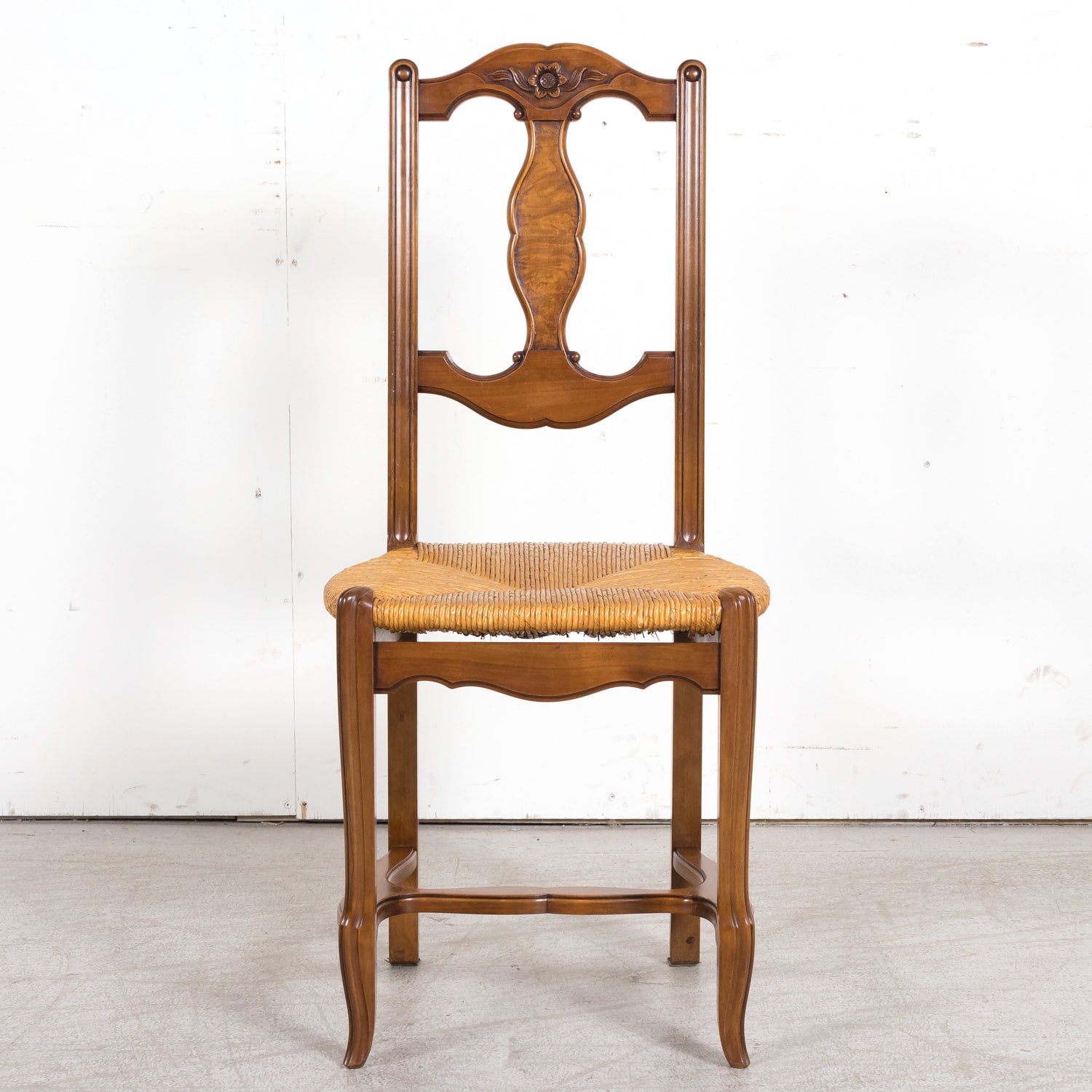 Set of Eight 19th Century Country French Louis XV Style Carved Walnut Dining Side Chairs with Rush Seats